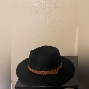 Black fedora hat. Good condition.